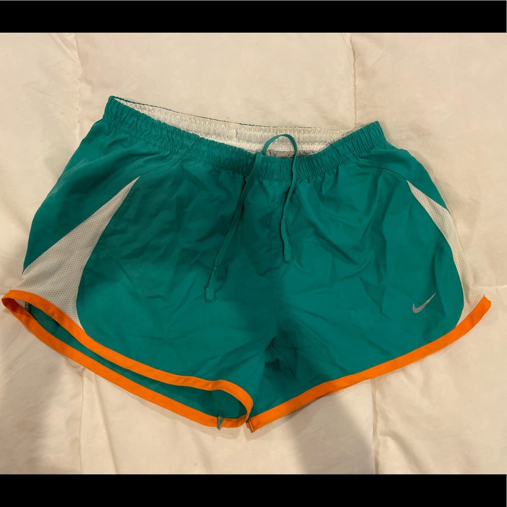 Green and orange Nike tempo shorts